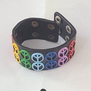 FREE w/ PURCHASE OVER $20 - Leather peace girl's wrist bracelet like new
